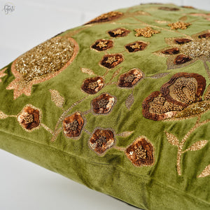 Coloured beads, glistening sequins and silk threads cushion cover close up