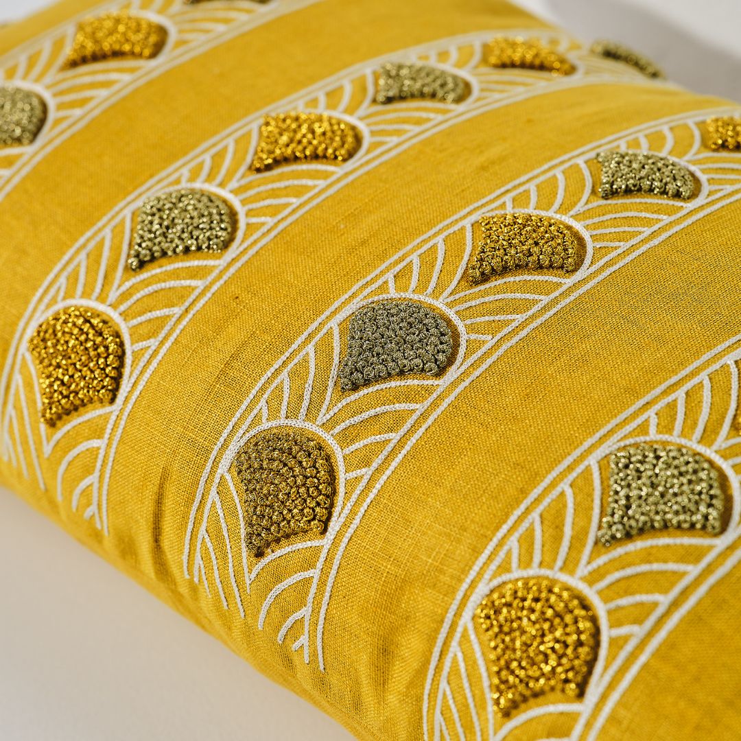 Embroidered cushion with gems 