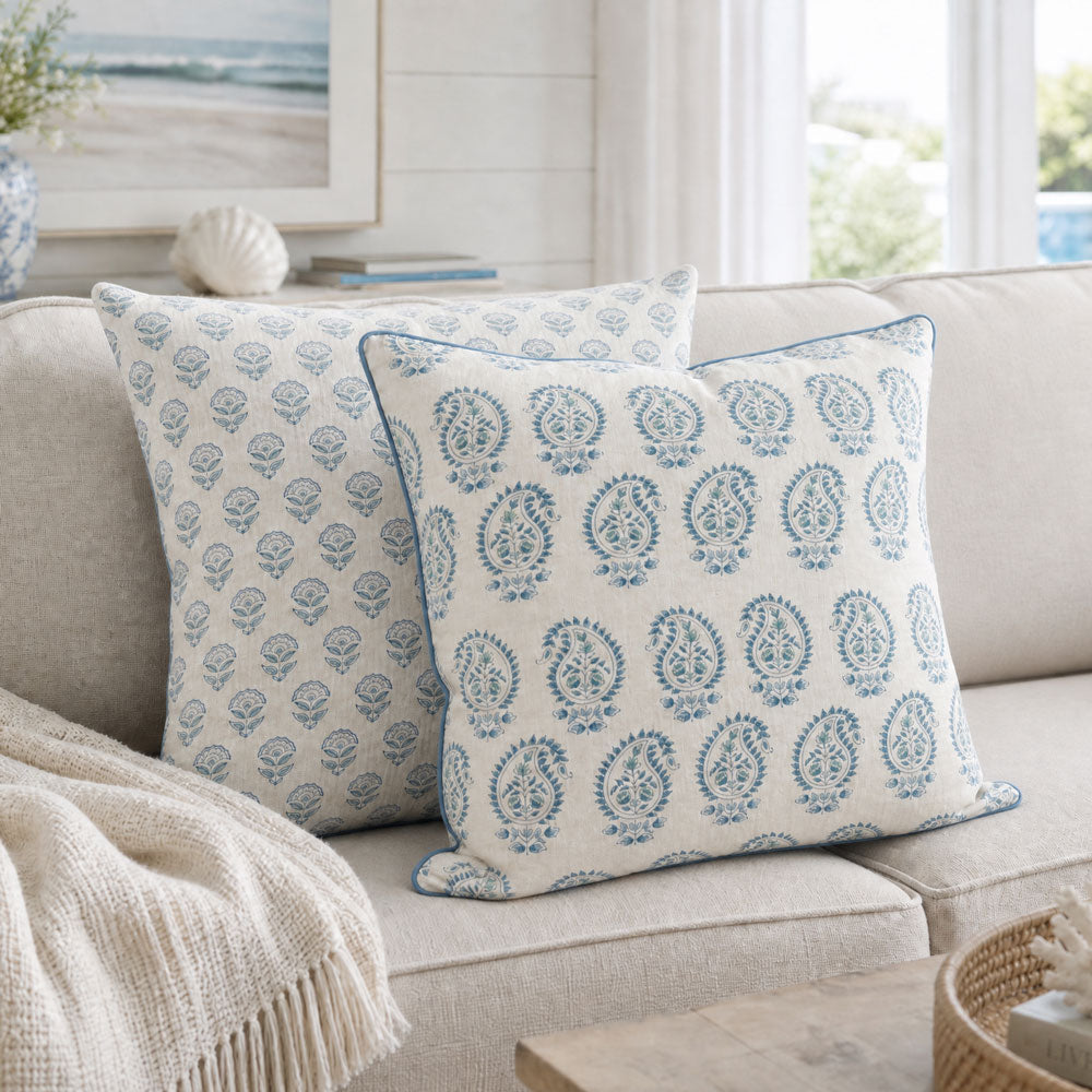 Amara cushion cover styled on a bed
