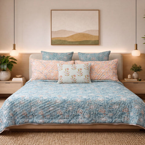 Aranyani Azure hand block-printed quilt on a styled bed