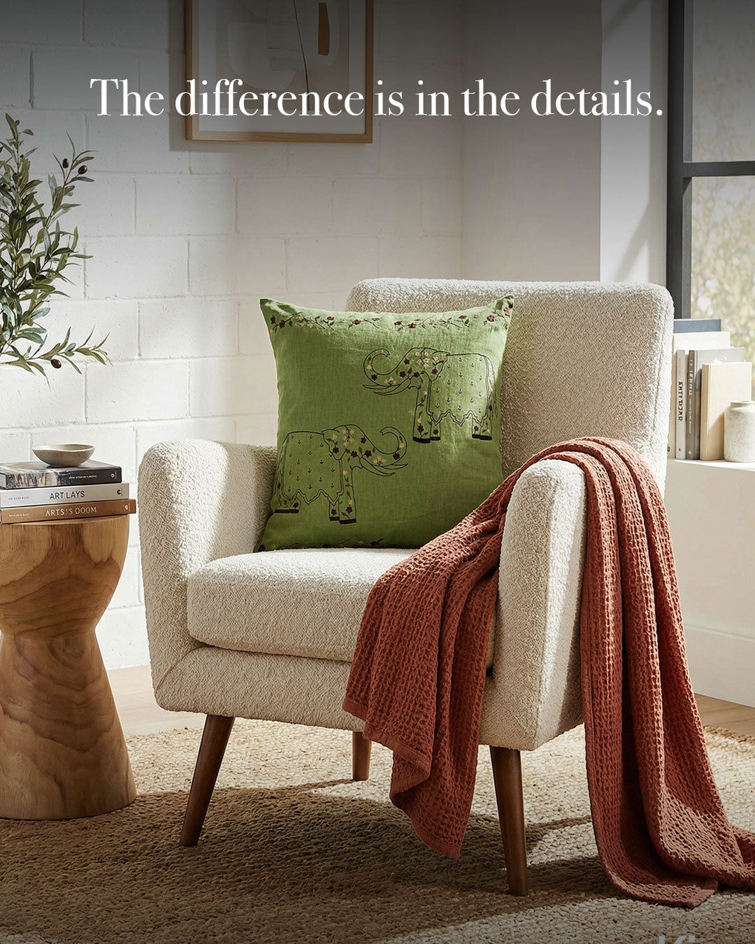 green pillow with elephants