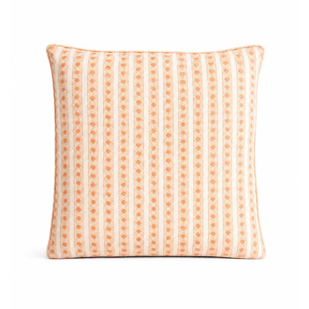 A square decorative throw pillow with a vertical striped pattern in peach and cream, set against a plain white background.